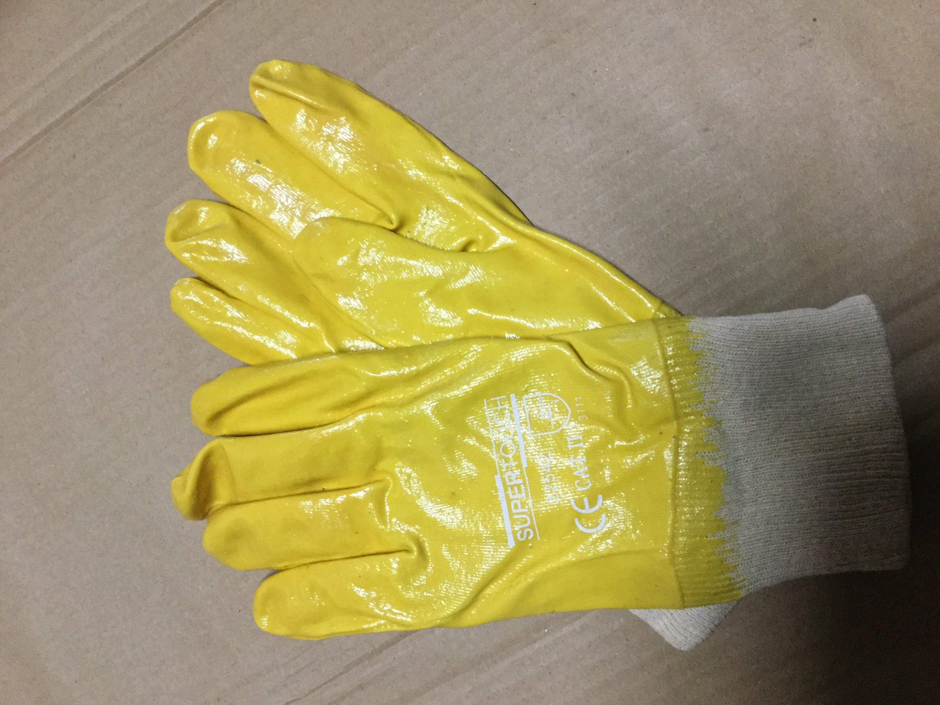 Nitrile lightweight full dip nit wrist gloves